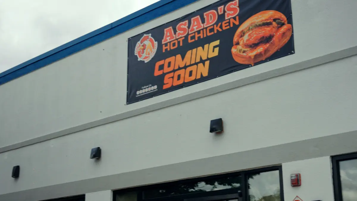 Asad's Hot Chicken Coming Soon banner on the Vineland, NJ store