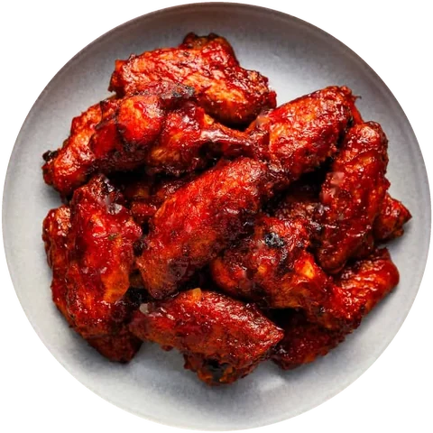Plate of sauced chicken wings